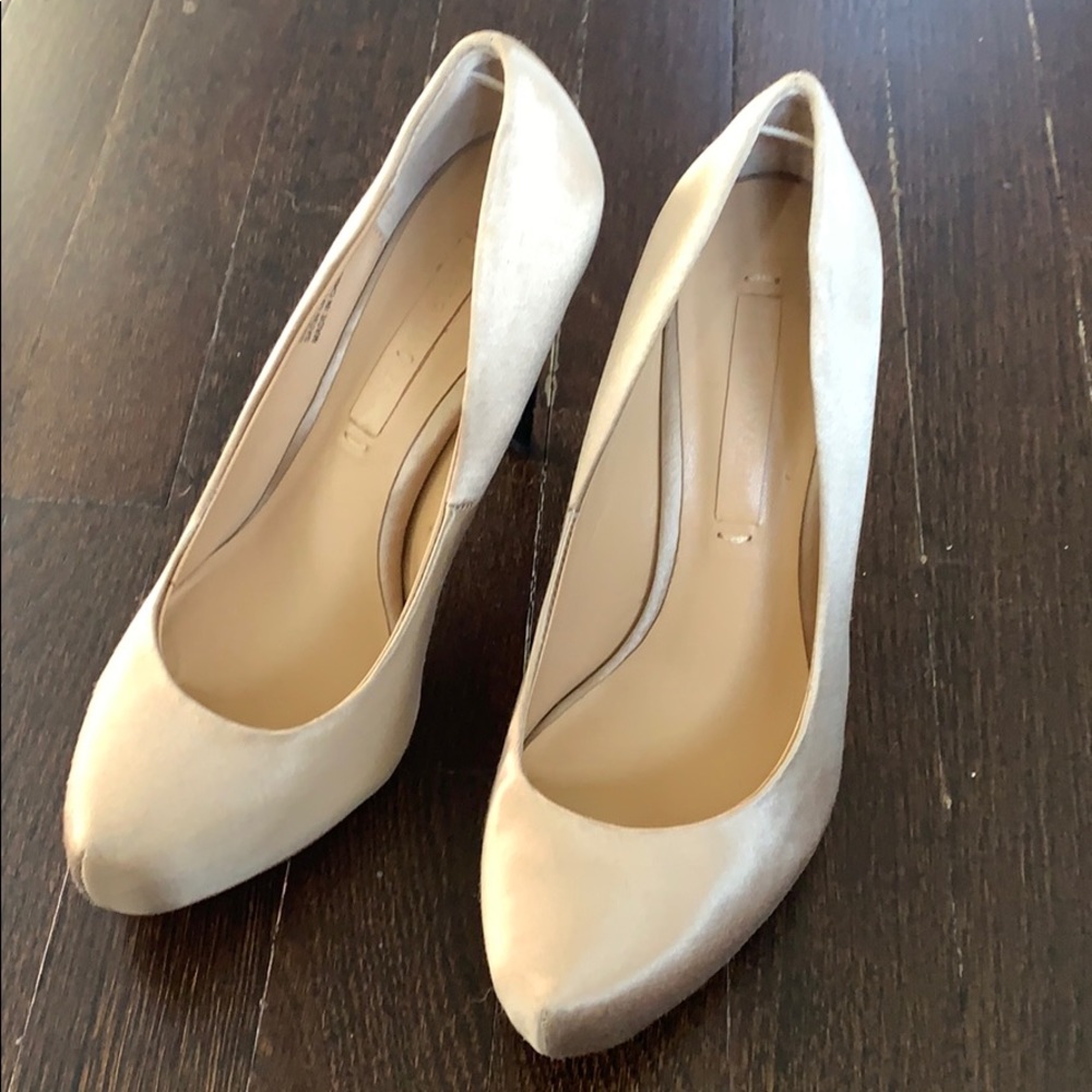 Satin tan and black pumps